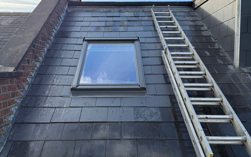 Natural slate roof with a neatly flashed skylight